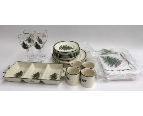 A small quantity of Spode 'Christmas Tree'; four christmas tree wine glasses; and some Christmas themed napkins etc 