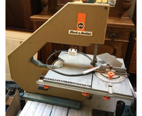A Black &amp; Decker bench mounted jig saw 