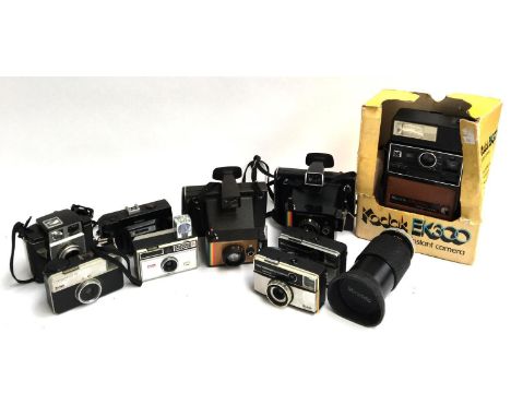 A mixed lot of cameras to include two Polaroid land camera 'Color swinger'; two Kodak 355X instamatics; Kodak Instamatic 104;