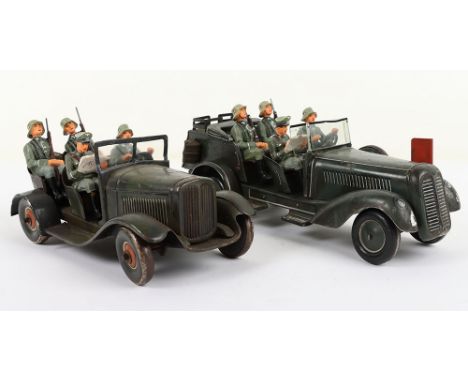 Clockwork Tinplate German Army Staff Car, made by Tipp-Co or Geisha. Complete with four re-painted composition figures. Accom