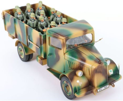Modern Model of a WW2 German Army Truck, constructed from wood and resin with camouflage paint scheme. Complete with 16 moder