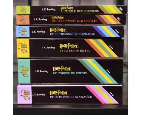 Six French first edition Harry Potter paperback books, lacking Deathly Hallows. UK P&amp;P Group 2 (£20+VAT for the first lot