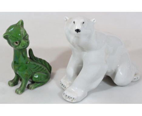 A USSR pottery figure of a polar bear, of large proportion, in standing pose, remnants of mark beneath, 28cm high, and an All