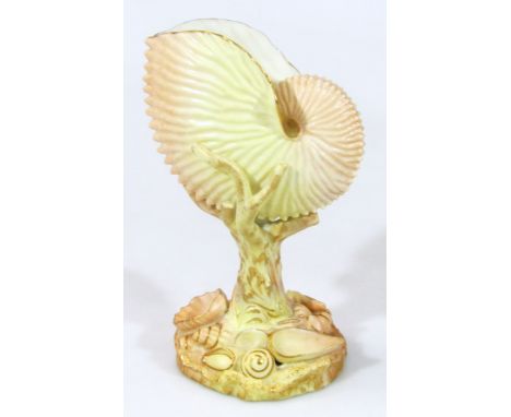 A late 19thC Royal Worcester shell ivory vase, number 101, on a naturalistic stem with shell capped base, purple marks beneat