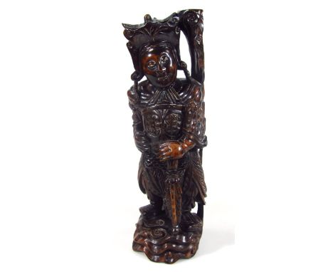 A heavily root carving Japanese lamp base figure, formed as a samurai in full dress on shaped base aside naturalistic branch 