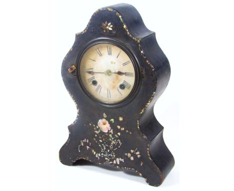 A late Victorian clock case, with mother of pearl inlay, of shaped outline, with later 13cm dia Roman numeric dial, revealing