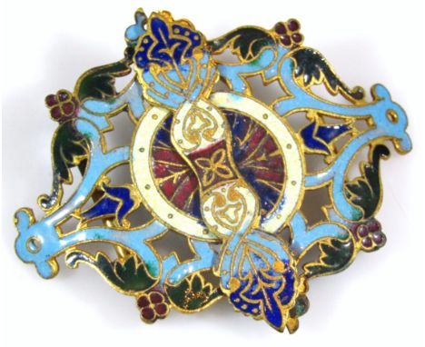An early 20thC enamel and base metal double buckle, of shaped outline decorated with pierced scrolls and flowers, with gilt h