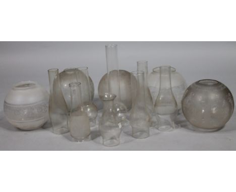 Various oil lamp shades, to include a frosted and clear glass Edwardian example, 20cm high, various others, funnels, etc. (a 