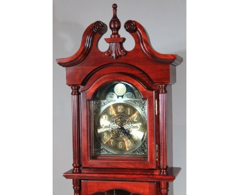 A modern Tempus Fugit style long case clock, with 24cm arched moon dial in a swan neck pedimented case, centred by an urn fin