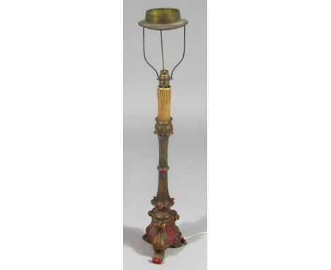 A giltwood table lamp, with handle and wire work sconce, inverted scroll stem and shaped triple scroll foot, with modern elec