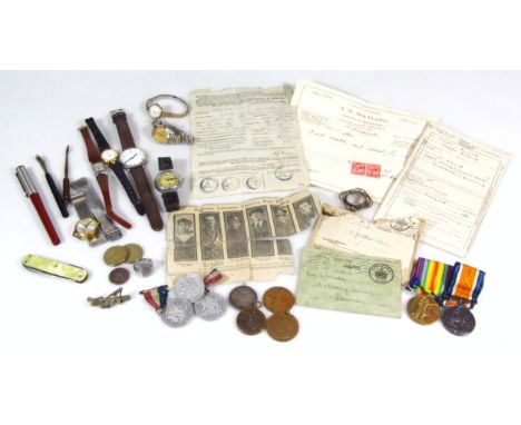 A WWI medal duo, comprising Campaign and Victory medals with ribbons, with associated paperwork, each similarly marked 028451