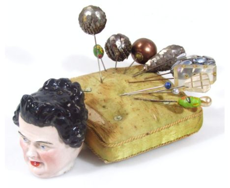 Various Victorian and later hat and stick pins, to include orb topped example, 12cm high, a pin cushion and a double sided Co