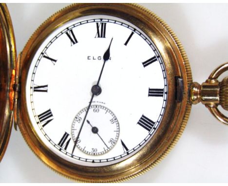 A mid 20thC Elgin 20thC hunter pocket watch, of circular outline with vacant cartouche and part engine turned case, hinging t