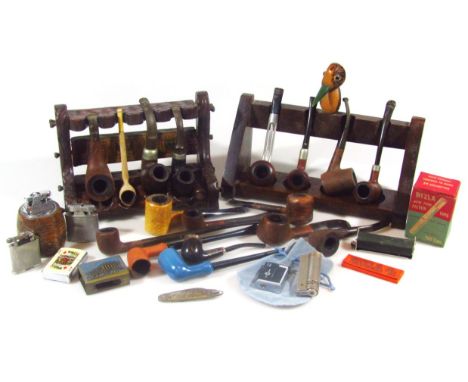 Various pipes and smoking related items, to include pipe rack, 21cm wide, in excess of 15 early to mid 20thC pipes, novelty a