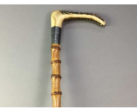 WALKING STICK ALONG WITH TWO CANES AND TWO UMBRELLAS  the walking stick with horn handleQty: 5