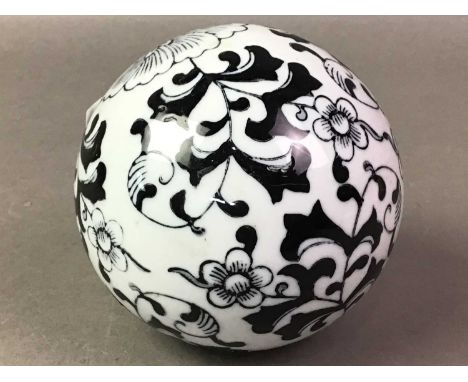 GROUP OF SEVEN DECORATIVE CERAMIC BALLS each decorated with different patterns and colourways
