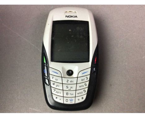 COLLECTION OF VINTAGE MOBILE PHONES including an early IPhone and three Nokia models