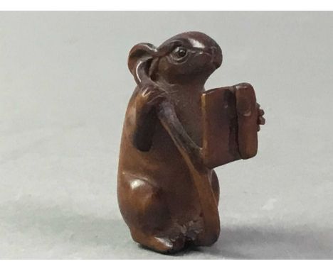 COLLECTION NETSUKE 20TH CENTURY  including one formed as a boy in ivorine and five carved wood examplesQty: 6