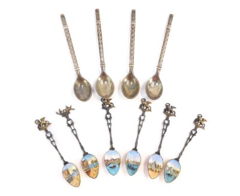 A set of six Continental enamel teaspoons, each with lion finial top on a pierced stem, on gold coloured base, with enamel fr