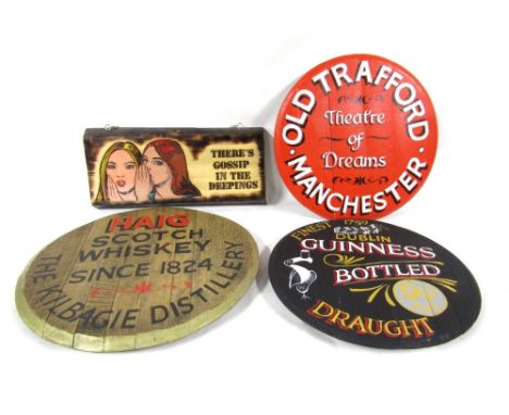 Four bar signs, comprising two painted barrel lids, a wooden plaque marked 'There's Gossip in the Deepings', an Old Trafford 