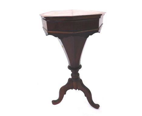 A 19thC mahogany sewing table, with octagonal inlaid top, and trumpet shaped centre,  with brass lock plate, on tripod base, 