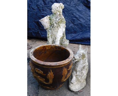A group of garden ornaments, comprising a cast concrete figure of a maiden carrying water vessel, 70cm high, figure of a seat