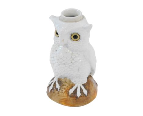 A late 19thC continental porcelain owl table lamp base, with applied glass eyes, on a painted brown base, No 5482, 16cm high.