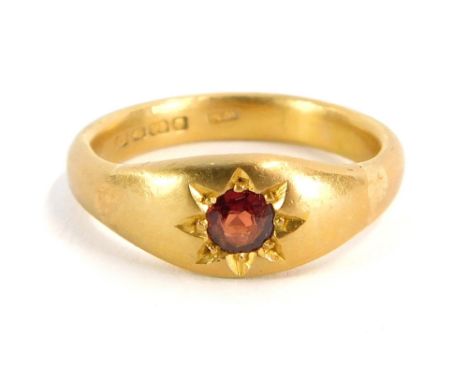 A 22ct gold dress ring, with illusion set ruby, on a converted band, Birmingham 1927, size S 1/2, 9.7g all in.