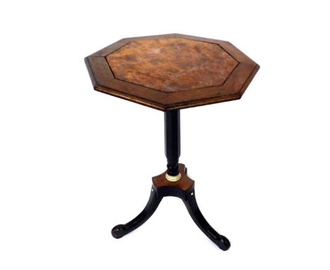 A Victorian walnut and ivory table, the octagonal top with central panel, on a part turned tripod base, 54cm high, 40cm diame