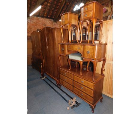 A John W Talton walnut bedroom suite, comprising double bed frame, including  head board, foot board and two metal supports, 