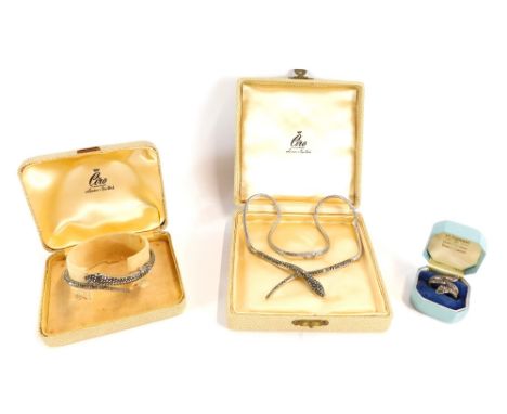 A silver and marcasite set snake jewellery suite, comprising necklace, hinged bangle and dress ring, each marcasite set with 