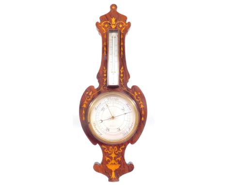 A Victorian rosewood and inlaid aneroid barometer by W H Bird of Grantham, with thermometer, above silvered weather dial with