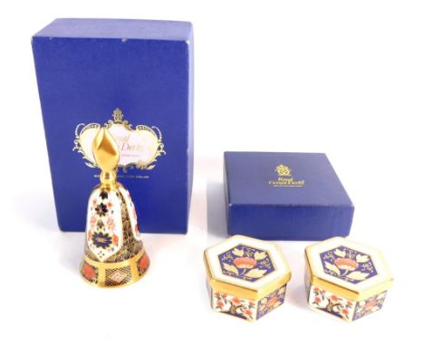 A Royal Crown Derby Imari porcelain candle snuffer, of bell form, together with two hexagonal trinket boxes and covers, print