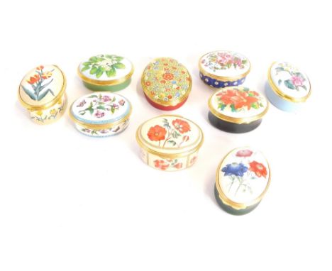 Halcyon Days enamel boxes, of oval form, various sizes, with botanical decoration. (9)