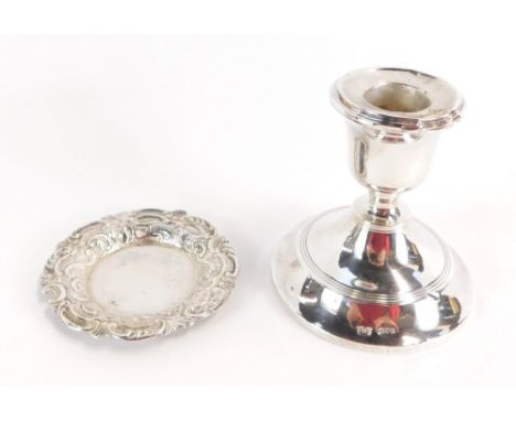 Two items of silver ware, comprising a Victorian silver pin dish with an embossed foliate scroll decoration, Glasgow 1892, to