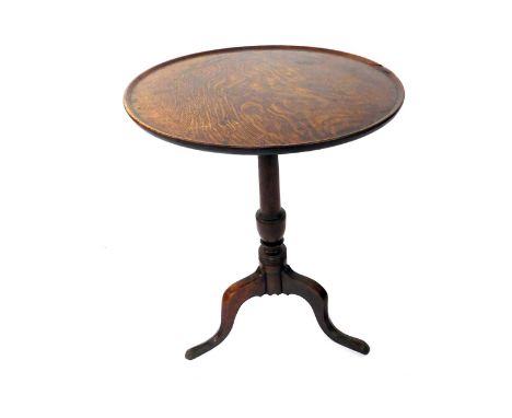 A 19thC oak tripod table, the circular moulded top on a boulbos stem, tripod base, 70cm high, 55cm diameter. 