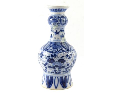 A Delftware blue and white vase, of bulbous form, decorated with flowers and birds, printed marks, 17cm high.