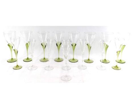Two sets of Rosenthal studio line glasses, comprising a set of eight green stemmed wine glasses, and two smaller sherry glass