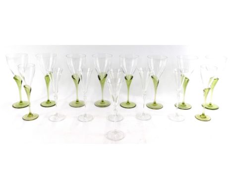 Two sets of Rosenthal studio line glasses, comprising a set of eight green stemmed wine glasses, and two smaller sherry glass