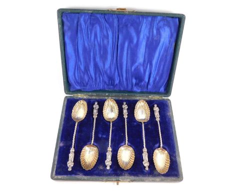 A set of six Victorian silver teaspoons, each with apostle finial and a twist stem with shell bowl, Birmingham 1900, 1¼oz, in