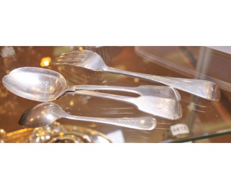 SILVER SPOONS. Two silver dessert spoons assay London 1851, a silver fork assay London 1872 and a silver teaspoon assay Birmi