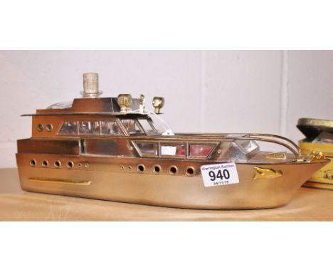 BOAT DECANTER. Vintage boat shaped musical decanter c1960 with four shot glasses