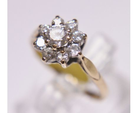 DAISY CLUSTER RING.  9ct daisy cluster ring size O 1/2