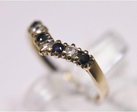 DIAMOND AND SAPPHIRE RING. 9 ct gold diamond and sapphire ring, size K