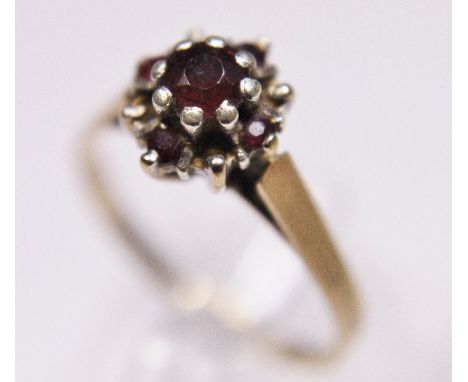 RUBY & DIAMOND. 9 ct gold ruby and diamond dress ring