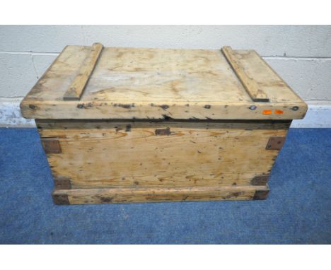 A PINE TOOL CHEST, with a hinged lid, and twin metal handles, width 81cm x depth 49cm x height 46cm, condition report: lockin