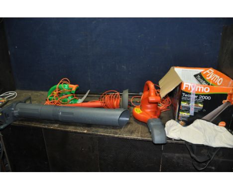 A FLYMO TWISTER 2000 GARDEN BLOWER VAC with original box and some accessories, a Flymo strimmer, a Powerbase hedge trimmer (a