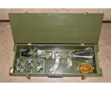 RED ARMY VODKA GIFT BOX, containing a One Litre glass Kalashnikov rifle of Bartex Bartol Polish Vodka, 40% vol. 1L, one glass