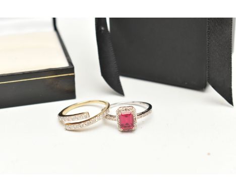 TWO 9CT GOLD GEM SET RINGS, the first a white gold ring set with a rectangular cut synthetic ruby, within a surround of singl