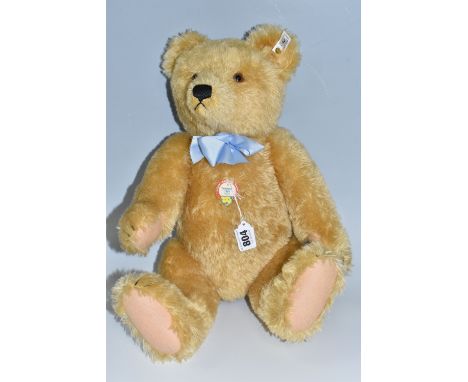 A STEIFF 1951 REPLICA BEAR made in 1997, with tags to the chest and ear with a golden pin, limited edition of 4000, numbered 